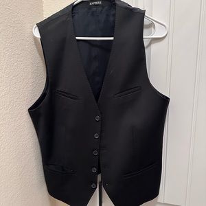 Three vests two are large and one is a medium